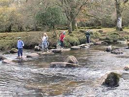 Crossing the Stepping Stones near Dartmeet - with our bikes.  8.6 miles into the ride
